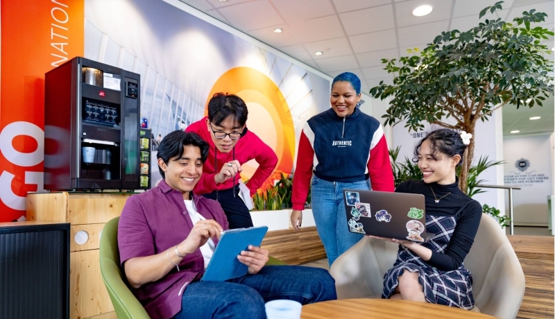International students studying in the lounge on the Arnhem campus of HAN University of Applied Sciences.