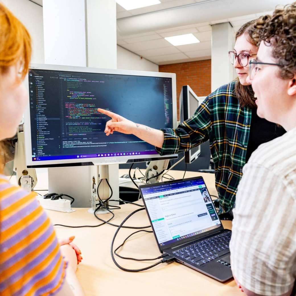 student behind a computer
