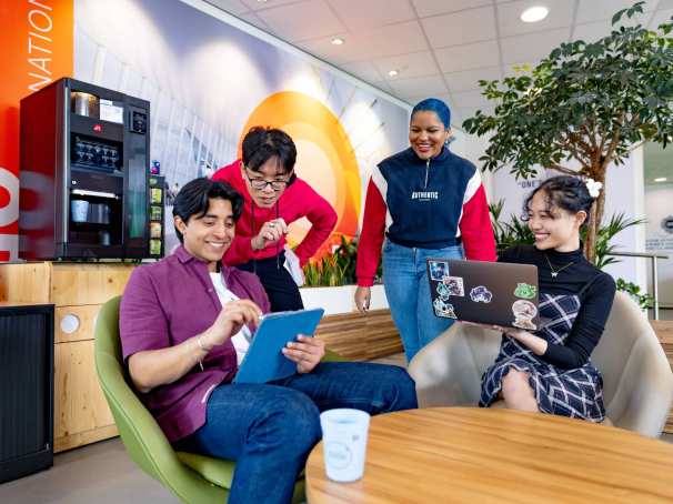 International students studying in the lounge on the Arnhem campus of HAN University of Applied Sciences. 