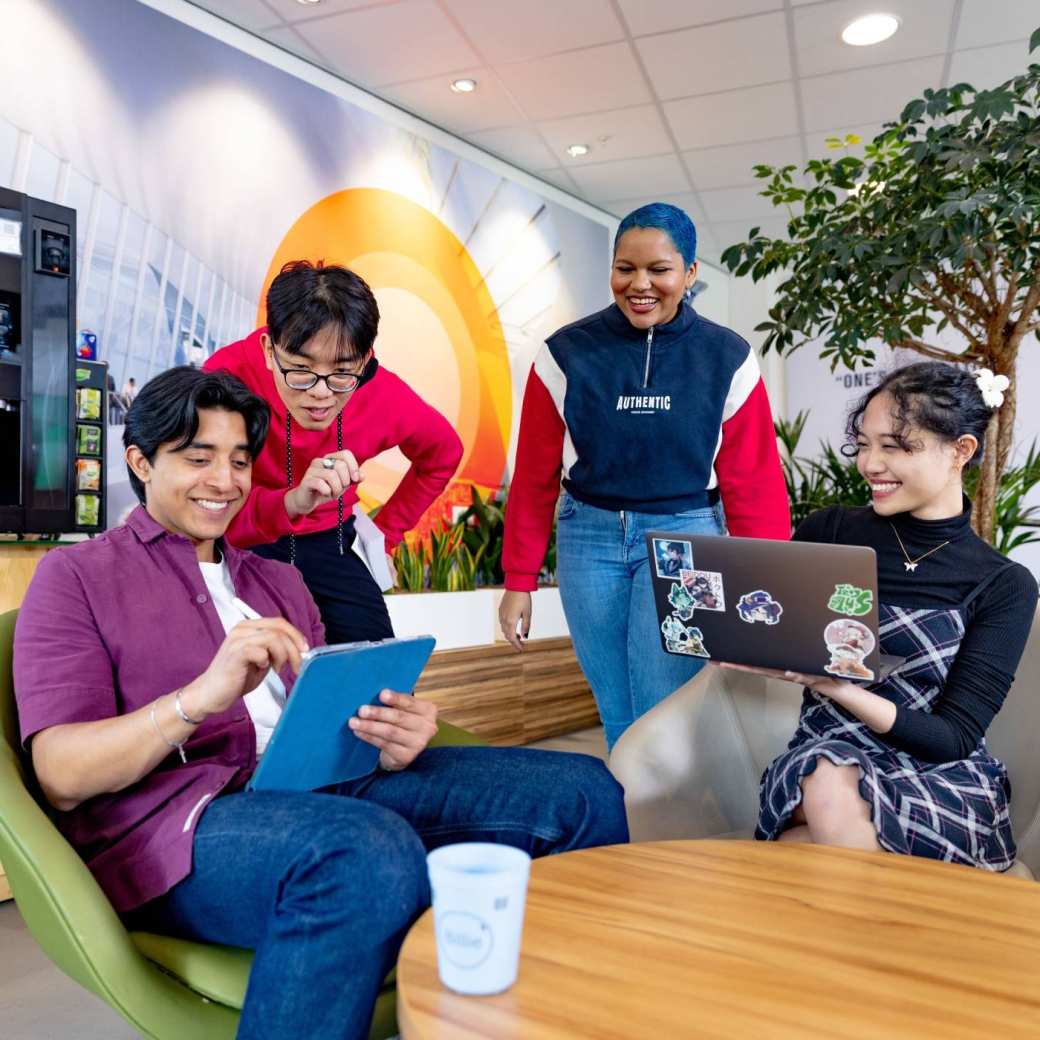 International students studying in the lounge on the Arnhem campus of HAN University of Applied Sciences.