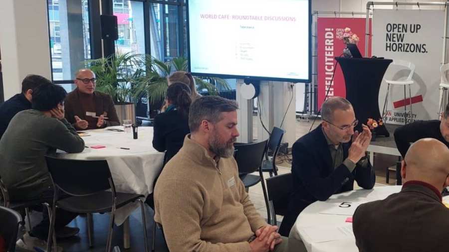 Opening moment of the AgriFood Forward World Café with participants gathered at HAN