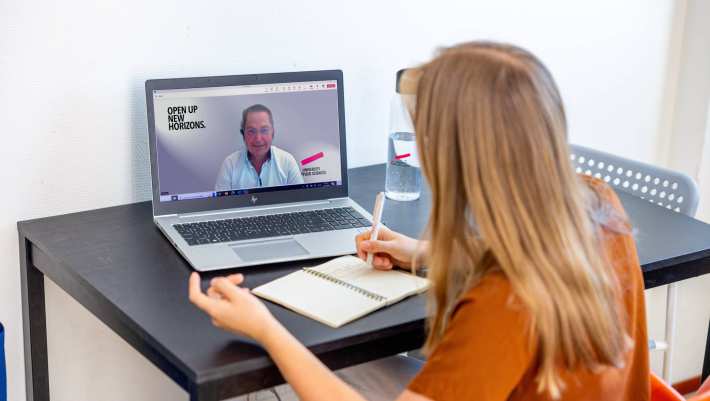 Personal 1:1 Meeting between Two People Behind Laptops about studying at HAN University of Applied Sciences