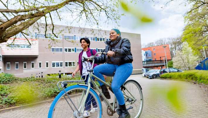 HAN student Chadionne cycling at the Arnhem campus