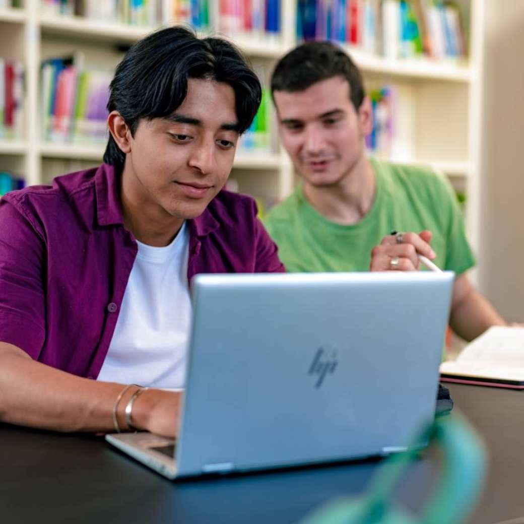 International students Diego and Andrei studying at the library on the Arnhem campus of HAN University of Applied Sciences.